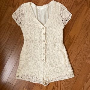 Cream crocheted button down romper